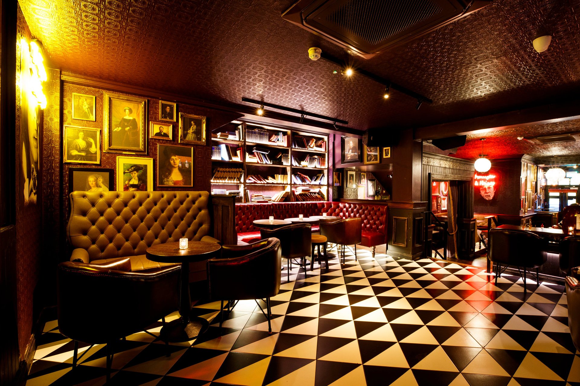 The ground-floor wooden bar and warm globe lighting at Mulligan House